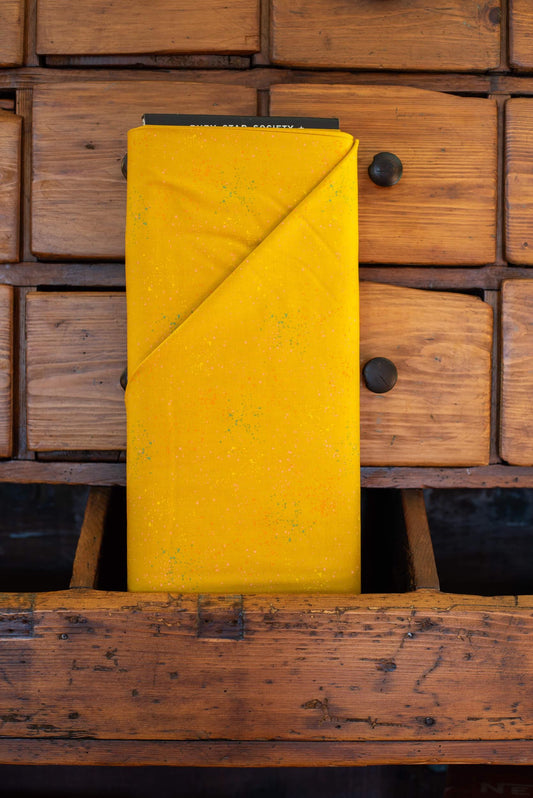 Ruby Star Society Speckled Fabric BTHY Color: Goldenrod